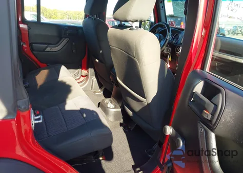 2012 Jeep Wrangler Unlimited Sport z USA, uszkodzony, nr VIN 1C4BJWDG4CL133248